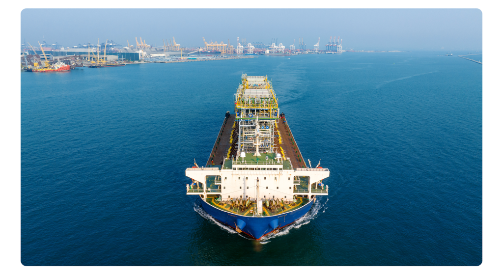 Specialized offshore cable-laying vessel installing high-voltage submarine power lines for Dubai's man-made islands.